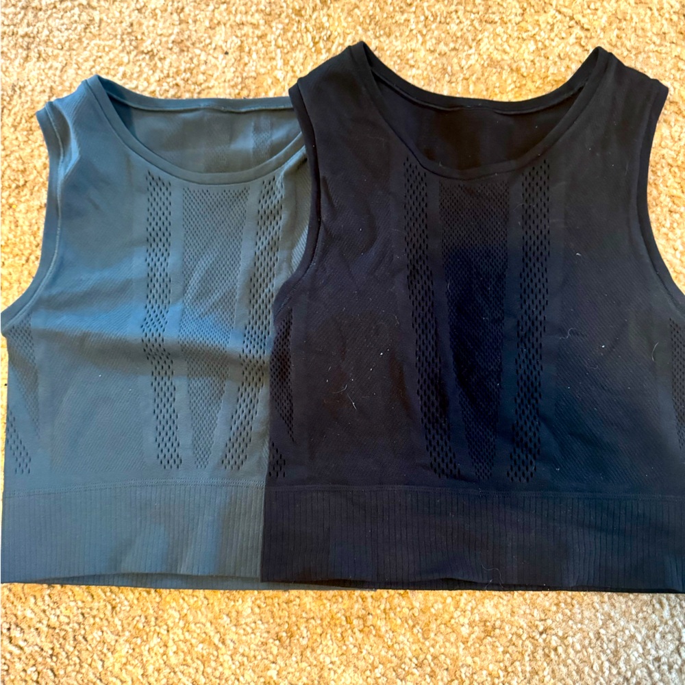 Two Athleta muscle yoga crop tops